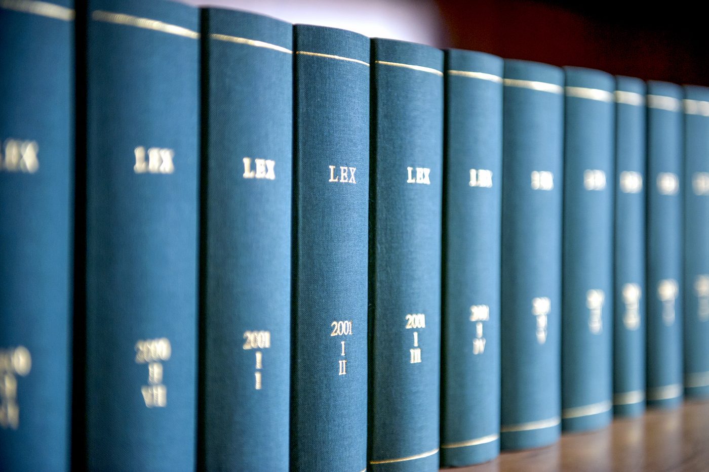A row of bound law reports on a shelf